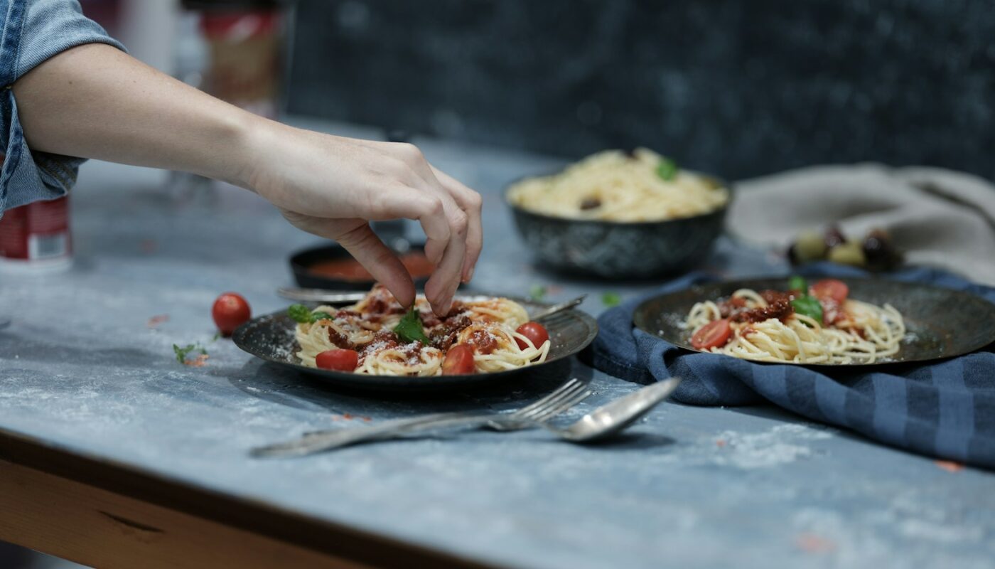 Person Holding Spaghetti