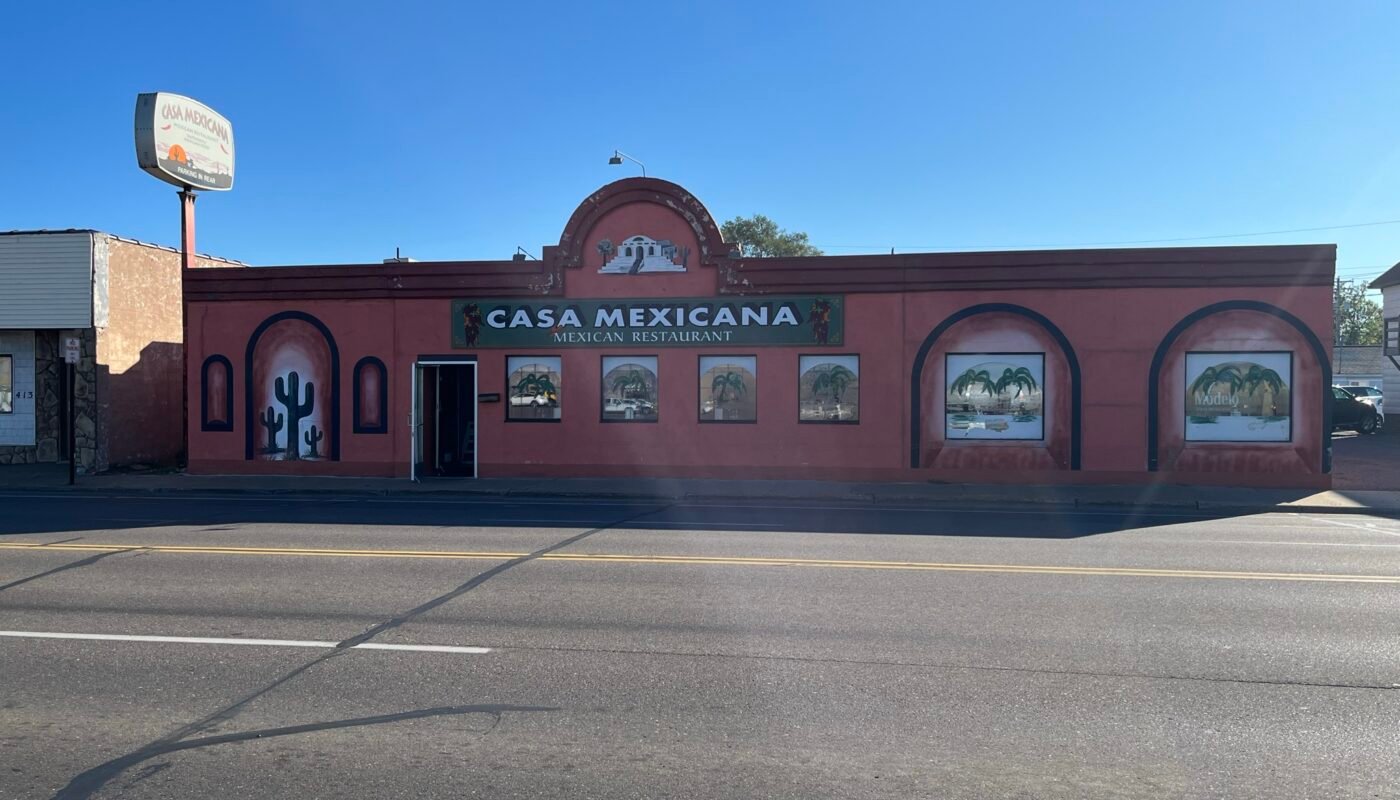 A Building With A Sign On The Side