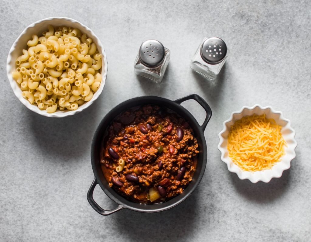 Chili Mac Recipe With, Macaroni, Cheese, And Seasonings.