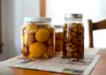 Jars Of Preserved Fruits On Table - Essential Accessories For Canning