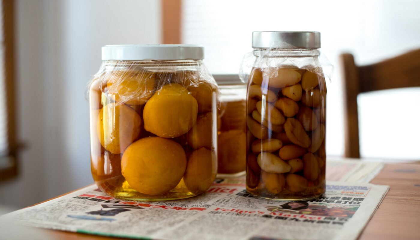 Jars Of Preserved Fruits On Table - Essential Accessories For Canning