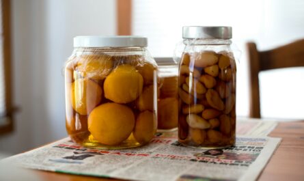 Jars Of Preserved Fruits On Table - Essential Accessories For Canning