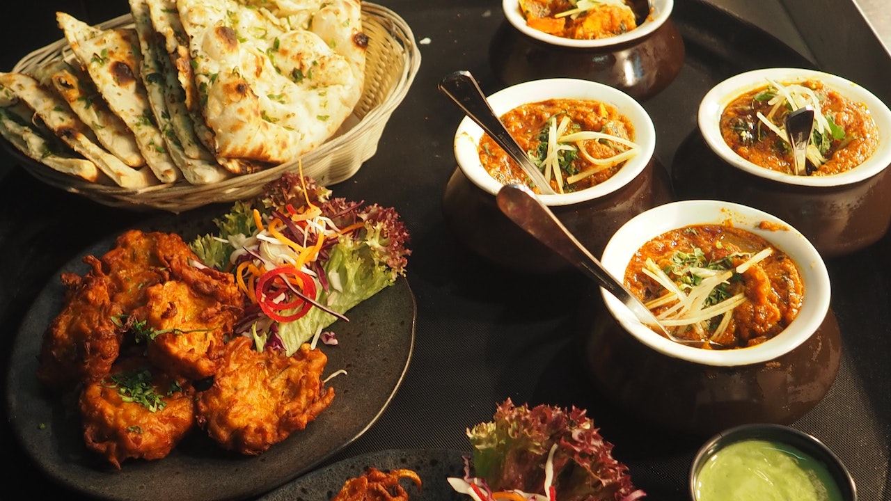 Delicious Indian Cuisine With Naan.